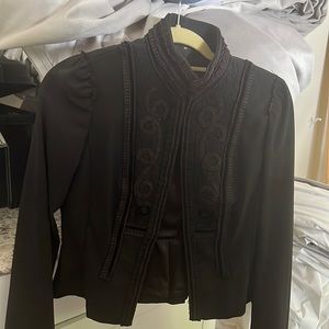 Black jacket with detail and stand up collar